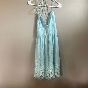 Teal Lacey summer dress, halter and cross cross back lacing. Never worn